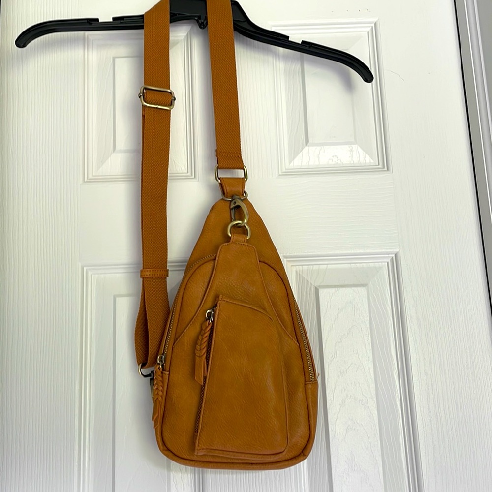 Brand new brown sling bag.